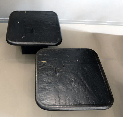 a pair of Paul Kingma black side tables