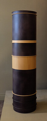 a set of 4 wooden black and natural totems